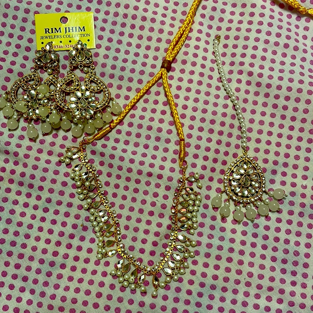 Necklace and earrings plus head band